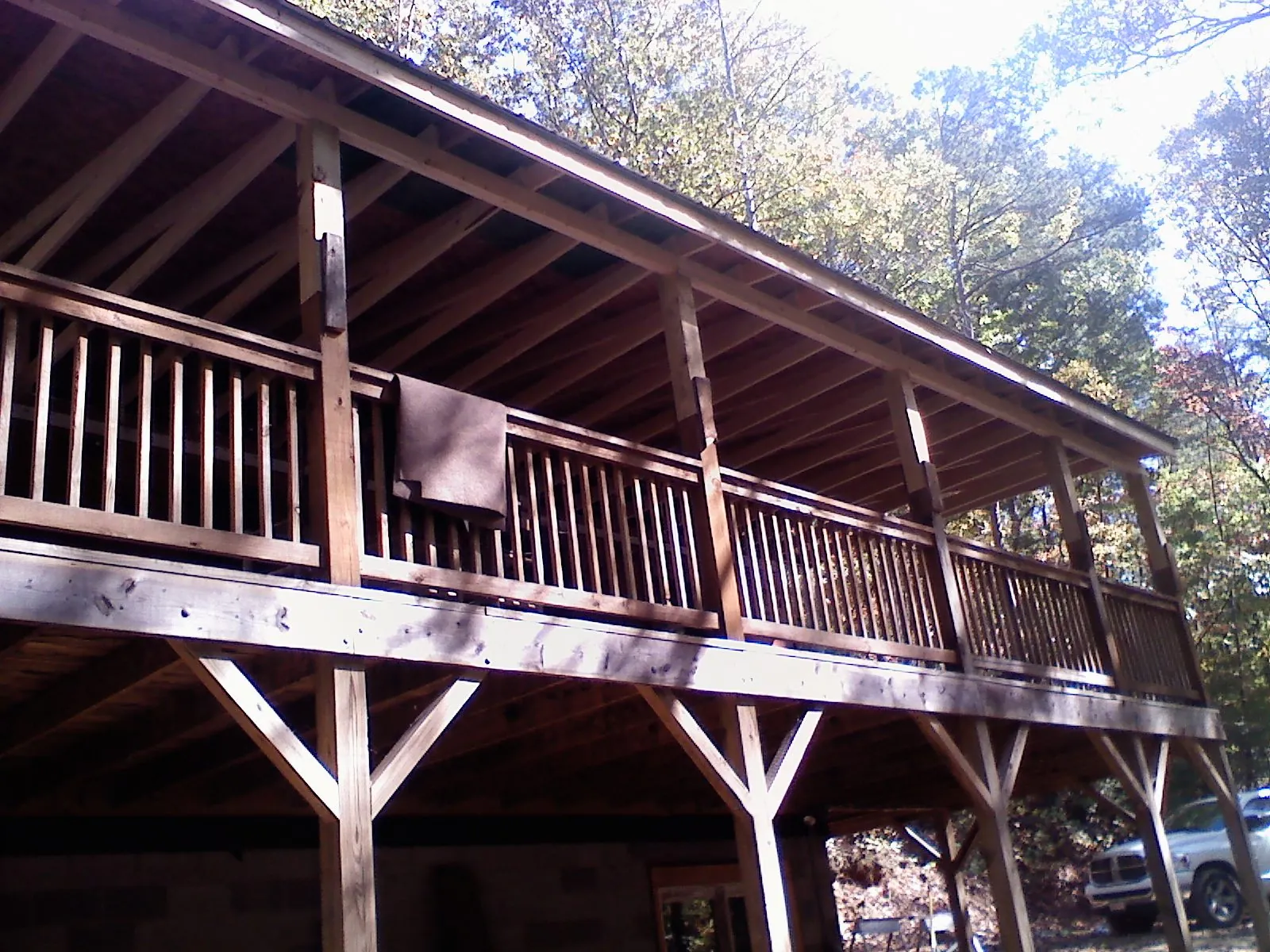 Timber framing under a new elevated porch and deck — Roof Leak Repair in Crystal Lake by Roofing Brothers